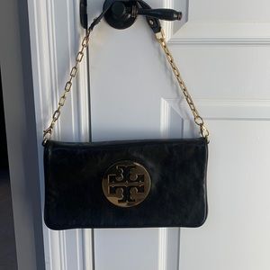 Tori Burch black leather clutch